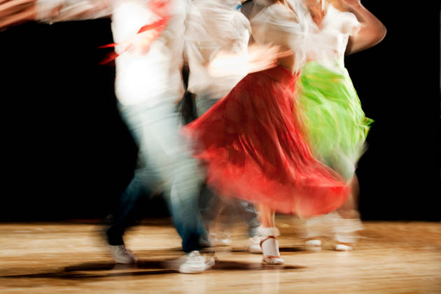 Blurred motion picture of dancers at a concert