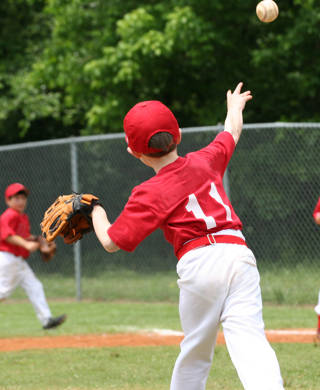 a little league play at first