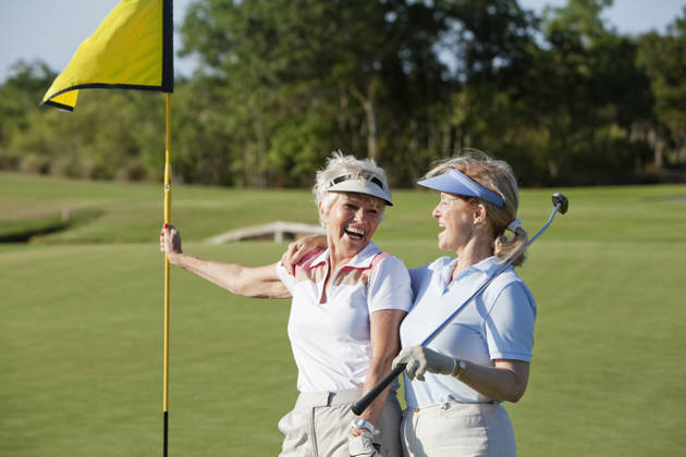 Friends enjoying a round of golf.