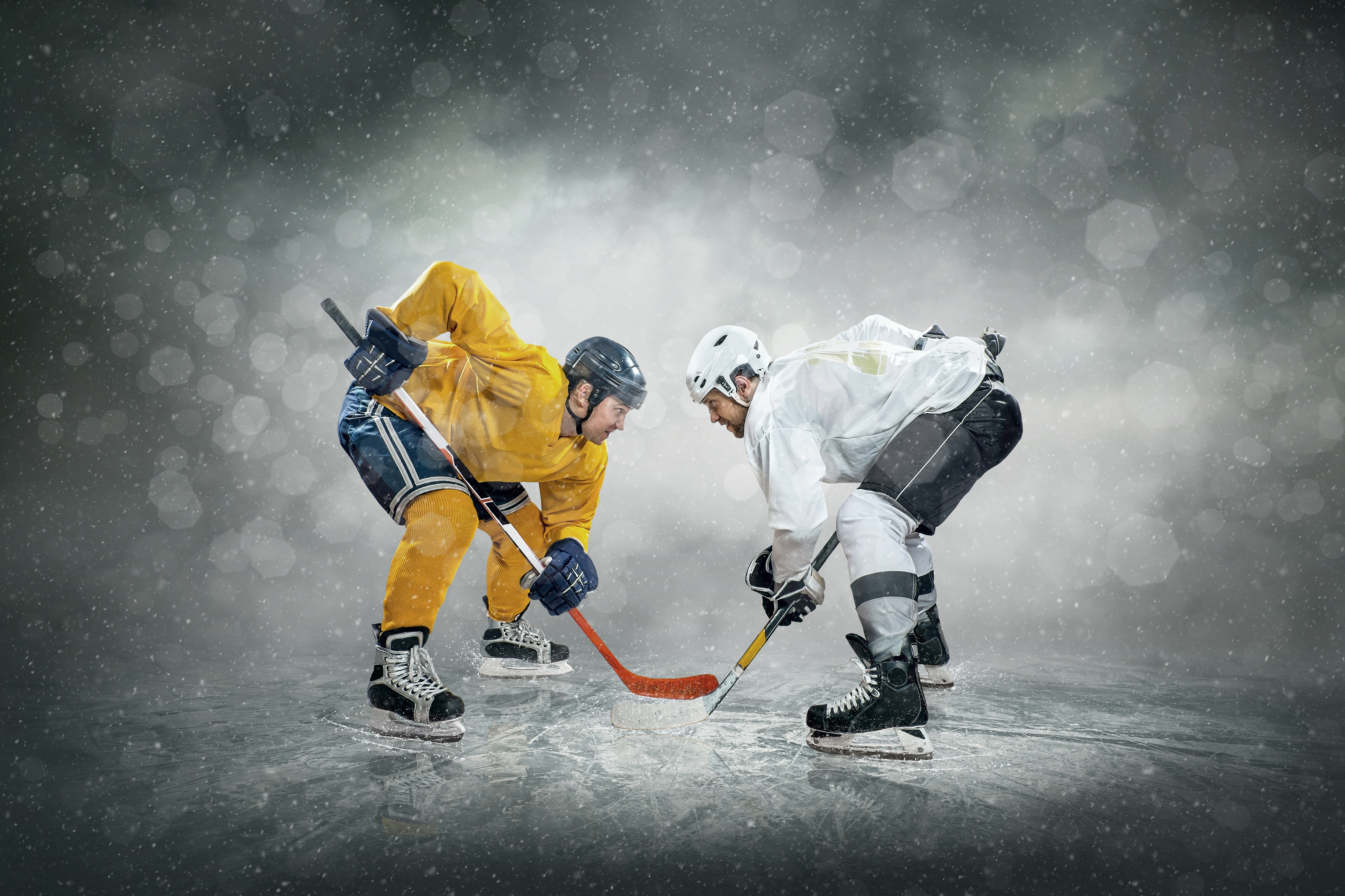 Ice hockey player on the ice, outdoors
