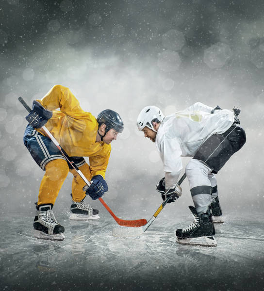 Ice hockey player on the ice, outdoors