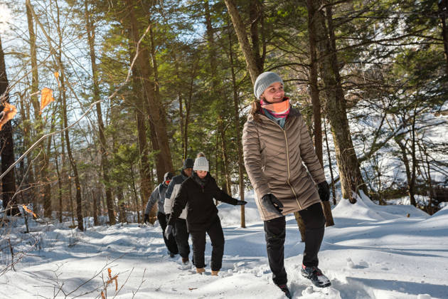People Hiking on the Mountain with Snow