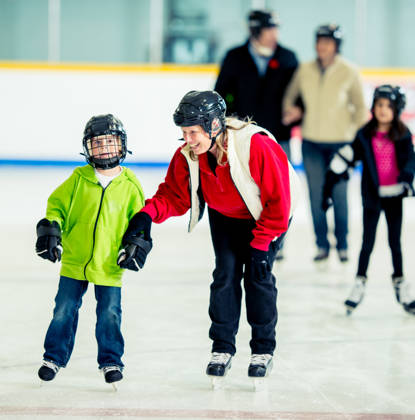 Ice skating at an indoor skating rink
