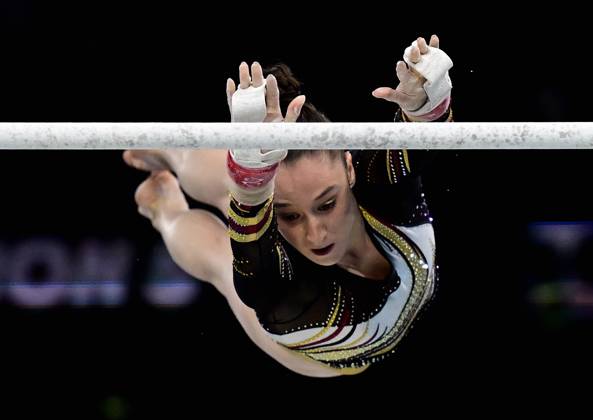 Belgian gymnast Nina Derwael pictured in action during the uneven bars exercise at the qualification for the women's subdivision 5 gymnastics competition at the Paris 2024 Olympic Games, on Sunday 28 July 2024 in Paris, France. The Games of the XXXIII Olympiad are taking place in Paris from 26 July to 11 August. The Belgian delegation counts 165 athletes competing in 21 sports. BELGA PHOTO DIRK WAEM