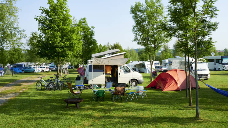 Away from Corona holiday with the rented caravan motorhome on campsite holiday