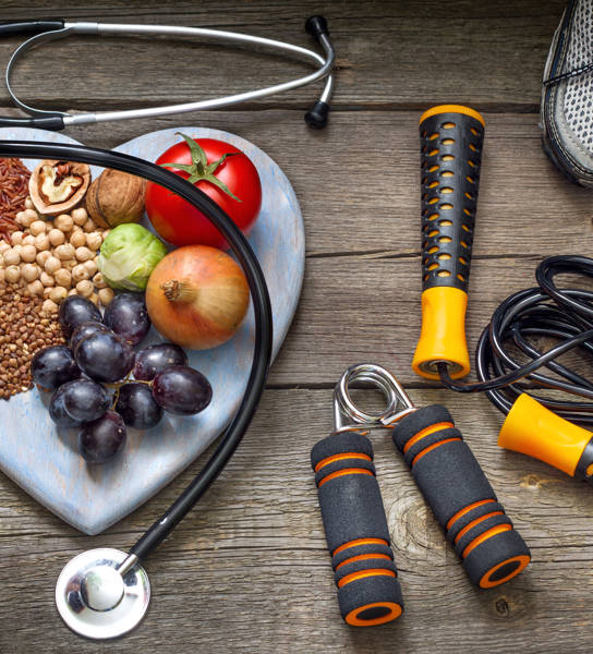 Zaden, noten en fruit, stethoscoop, springtouw en sportschoenen