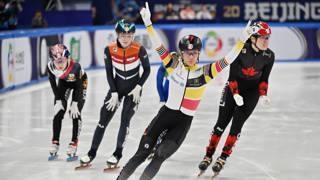 Belgium’s Hanne Desmet (C) celebrates her victory in the women’s 1000 meters final at the ISU World Short Track Championships in Beijing on March 15, 2025. (Photo by ADEK BERRY / AFP)
