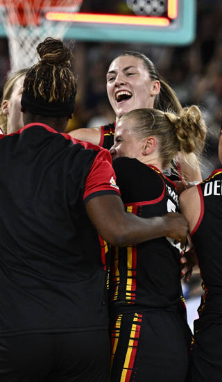 Belgian Cats' players celebrate after winning a basketball game between Spain and Belgian national team the Belgian Cats, a quarterfinal game of the women's tournament at the Paris 2024 Olympic Games, on Wednesday 07 August 2024 in Paris, France. The Games of the XXXIII Olympiad are taking place in Paris from 26 July to 11 August. The Belgian delegation counts 165 athletes competing in 21 sports. BELGA PHOTO JASPER JACOBS