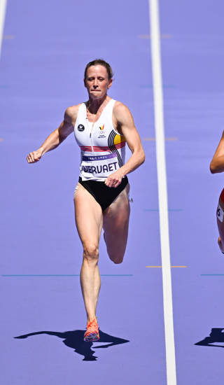 Belgian athlete Imke Vervaet (L) pictured in action during the Women's 200m repechage of the athletics competition at the Paris 2024 Olympic Games, on Monday 05 August 2024 in Paris, France. The Games of the XXXIII Olympiad are taking place in Paris from 26 July to 11 August. The Belgian delegation counts 165 athletes competing in 21 sports. BELGA PHOTO DIRK WAEM