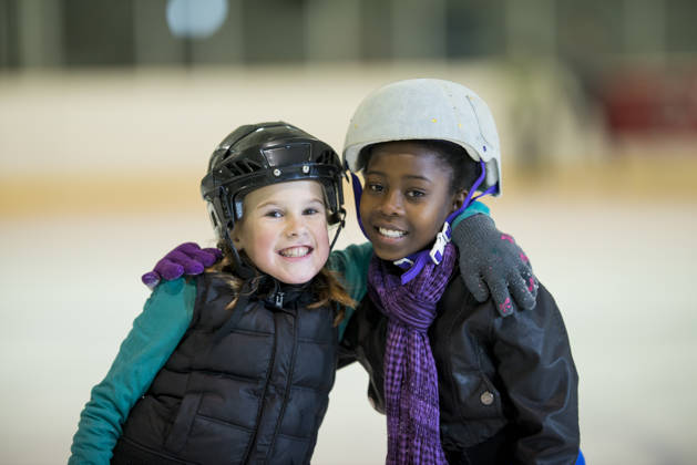 Kids having fun on skating rink