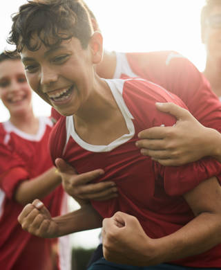 Lifestyle children training and playing soccer.