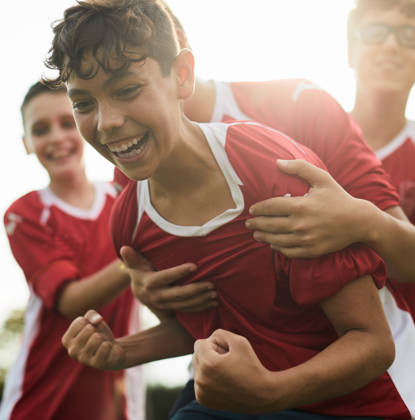 Lifestyle children training and playing soccer.