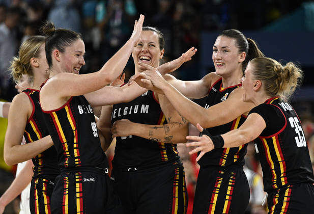 Belgium's Ine Joris, Belgium's Billie Massey, Belgium's Laure Resimont and Belgium's Julie Vanloo celebrate after winning a basketball game between Spain and Belgian national team the Belgian Cats, a quarterfinal game of the women's tournament at the Paris 2024 Olympic Games, on Wednesday 07 August 2024 in Paris, France. The Games of the XXXIII Olympiad are taking place in Paris from 26 July to 11 August. The Belgian delegation counts 165 athletes competing in 21 sports. BELGA PHOTO JASPER JACOBS