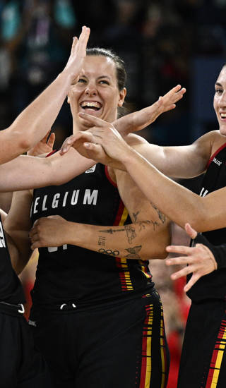 Belgium's Ine Joris, Belgium's Billie Massey, Belgium's Laure Resimont and Belgium's Julie Vanloo celebrate after winning a basketball game between Spain and Belgian national team the Belgian Cats, a quarterfinal game of the women's tournament at the Paris 2024 Olympic Games, on Wednesday 07 August 2024 in Paris, France. The Games of the XXXIII Olympiad are taking place in Paris from 26 July to 11 August. The Belgian delegation counts 165 athletes competing in 21 sports. BELGA PHOTO JASPER JACOBS