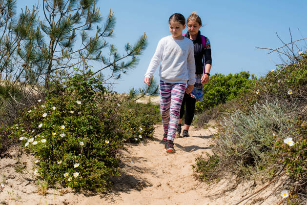 pretty little girl and her mother on vacation on the