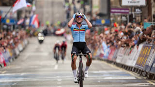 Belgian Lotte Kopecky of SD Worx celebrates as she crosses the finish line to win the elite women road race at the UCI World Championships Cycling, in Glasgow, Scotland, Sunday 13 August 2023. UCI organizes the worlds with all cycling disciplines, road cycling, indoor cycling, mountain bike, BMX racing, road paracycling and indoor paracycling, in Glasgow from 05 to 13 August. BELGA PHOTO DAVID PINTENS