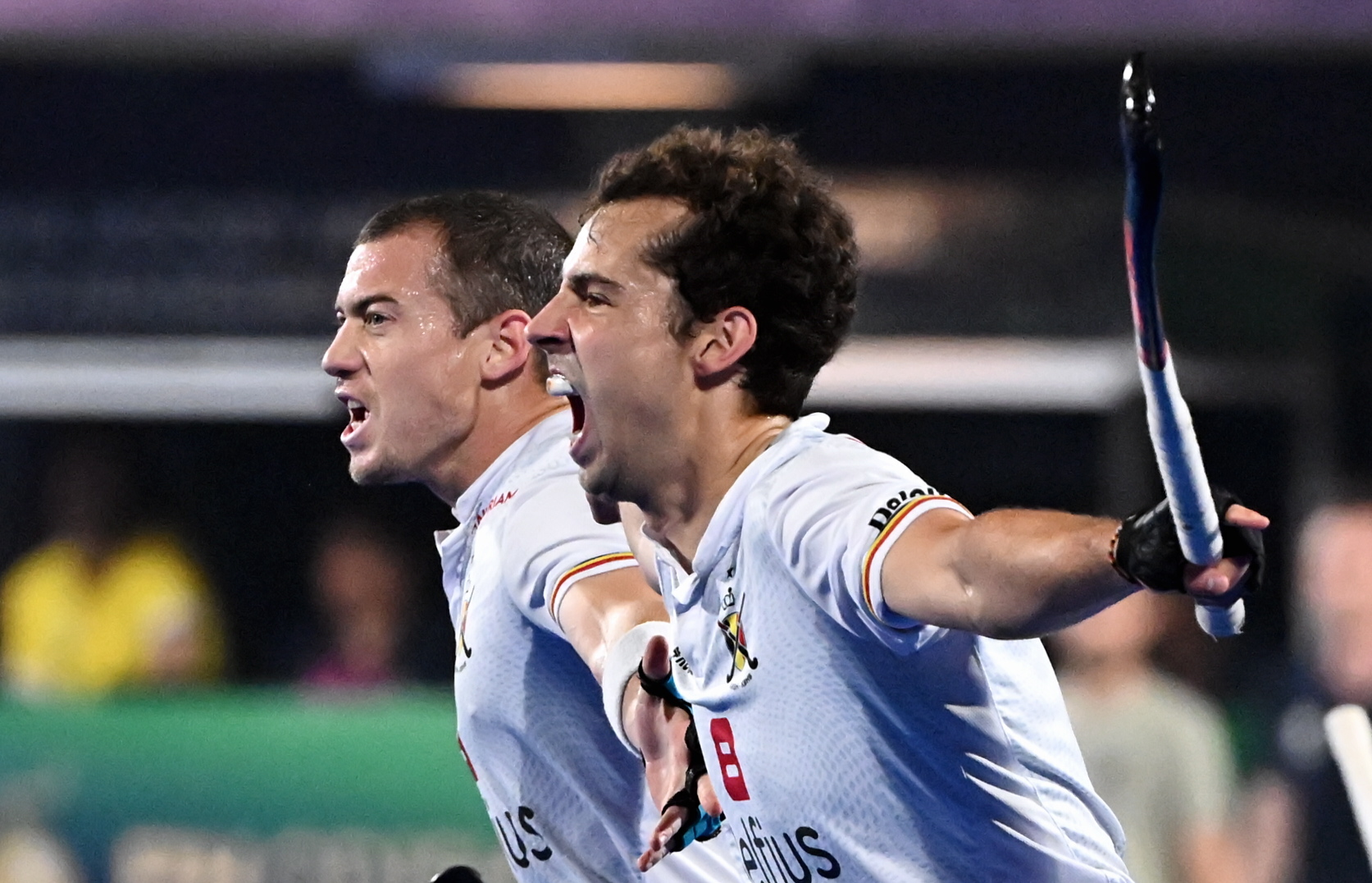 Belgium's John-John Dohmen and Belgium's Florent van Aubel celebrate after scoring during a game between Belgium's Red Lions and Germany, the final match at the 2023 Men's FIH Hockey World Cup in Bhubaneswar, India, Sunday 29 January 2023. BELGA PHOTO DIRK WAEM