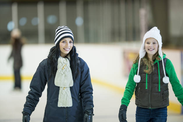 People having fun on skating rink