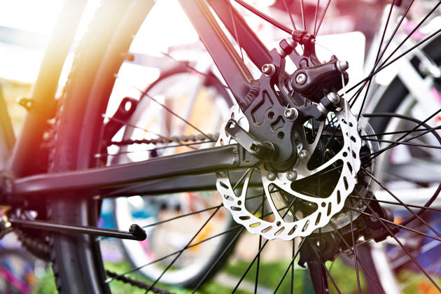 Brake disk of rear wheel sport mountain bike in shop
