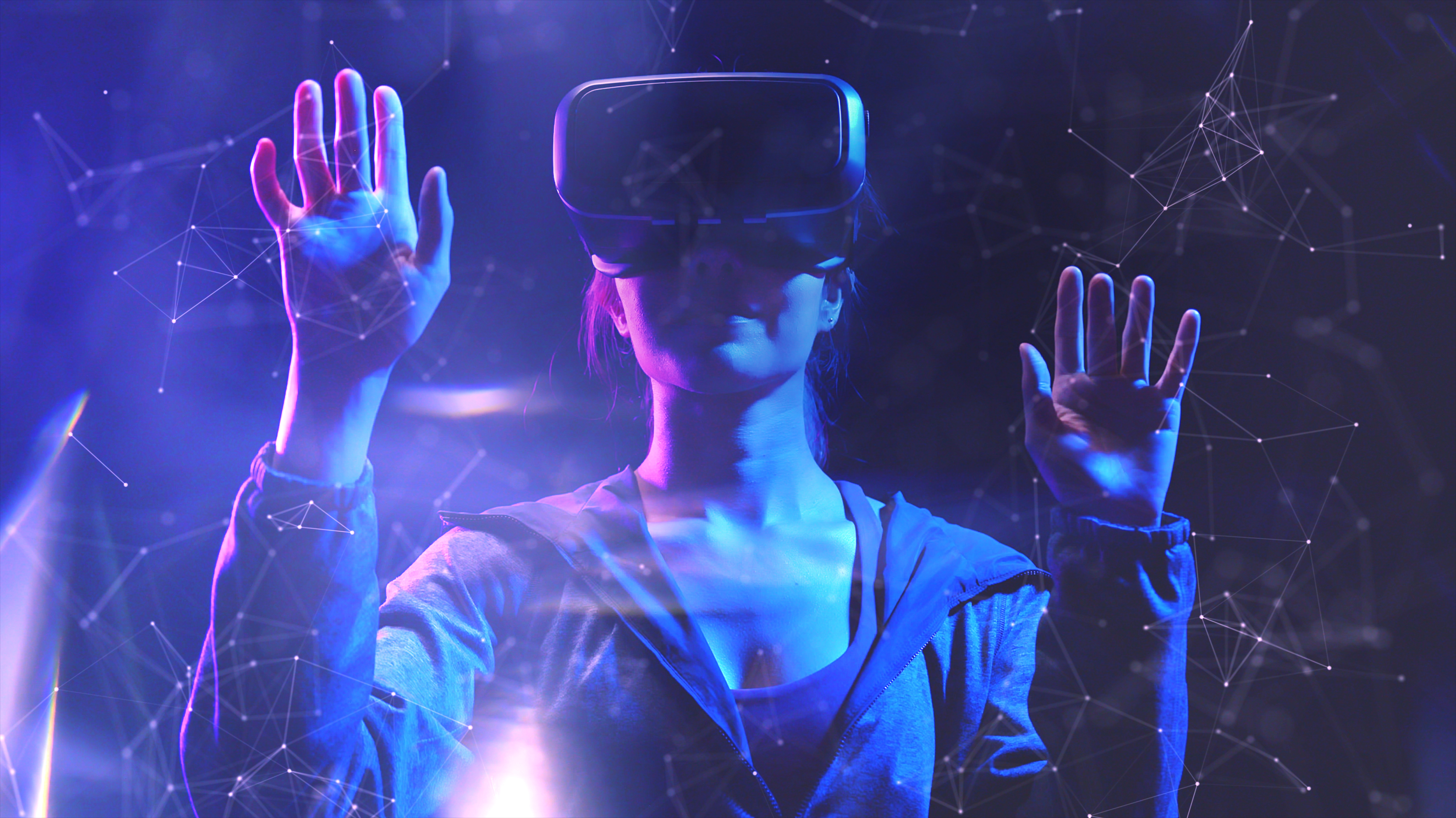 Teenager having fun play VR virtual reality glasses sport game 3D cyber space futuristic neon colorful background, future digital technology game and entertainment