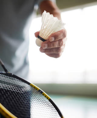Throw Racket Badminton Badminton player holding racket and shuttlecock while going to throw ...