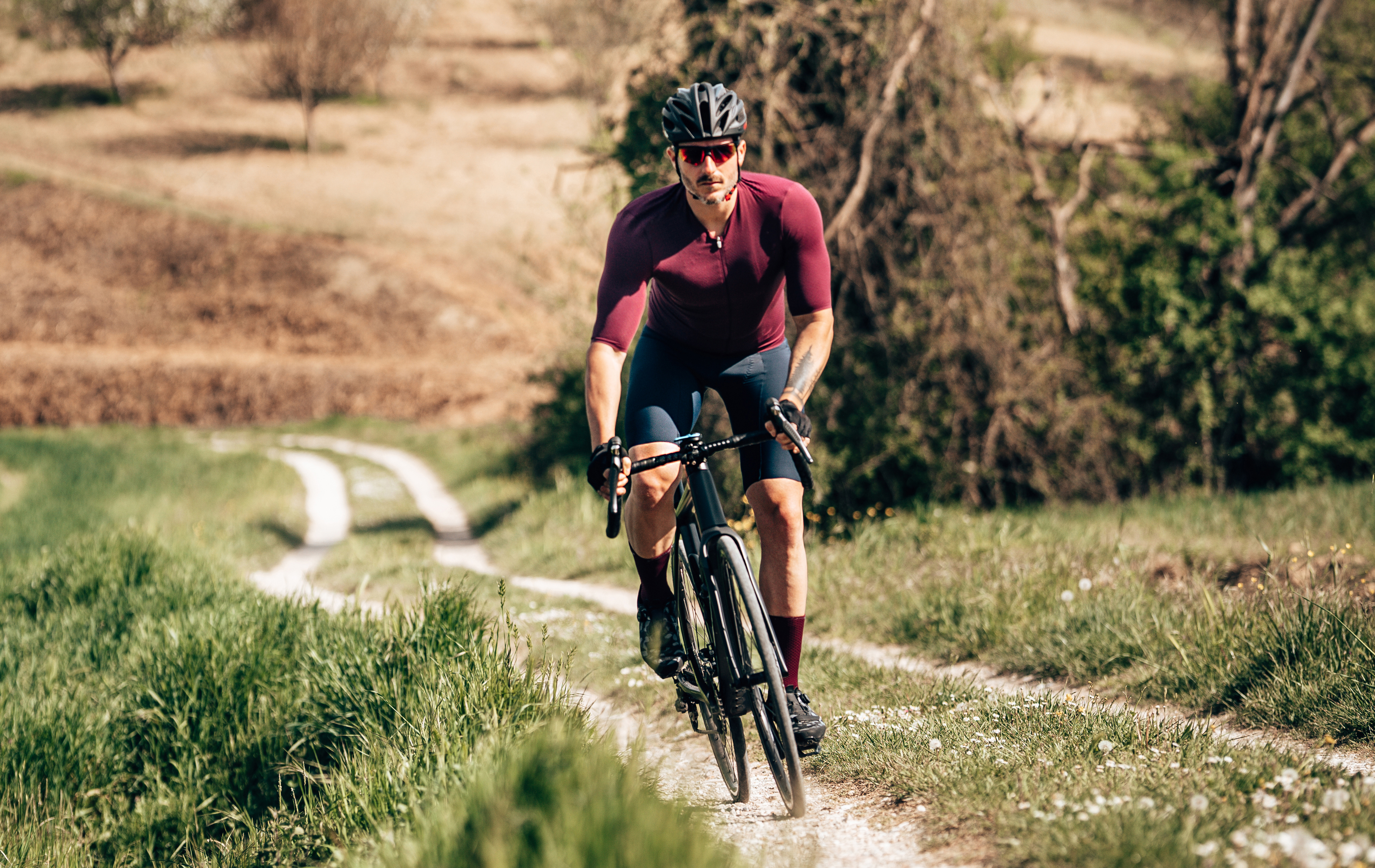 man riding on the gravel bike